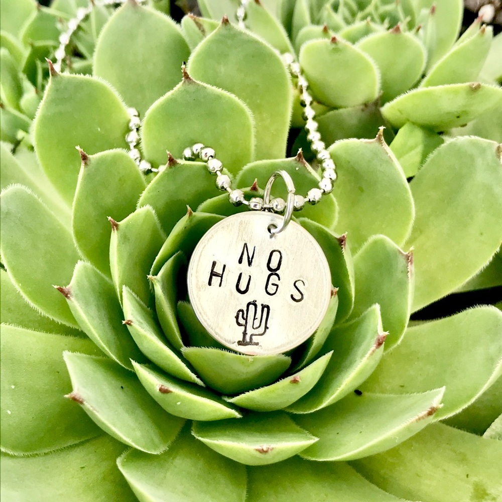 Hand stamped metal necklace
